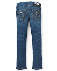 Old school cool: these True Religion skinny jeans feature distressed and ripped details with gold logo embroidery on the back pockets.