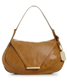 Shoulder this simple yet chic silhouette from Vince Camuto and instantly upgrade your everyday ensemble.  Luxuriously soft leather, gleaming golden hardware and refined detail stitching provide unquestionable allure, while the inside is all about keeping your essentials organized and in place.