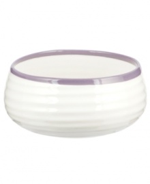 Distinctly ribbed Sophie Conran dinnerware sets your table with the charm of traditional hand-thrown pottery, but the durability of contemporary Portmeirion porcelain. Mix this banded Carnivale salad bowl with solid mulberry pieces.