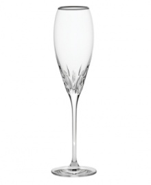 Inspired by the chic London neighborhood, Wedgwood Knightsbridge stemware features a delicately round shape with deep cuts around the bowl, accented with a platinum rim. The stem resembles a flower when viewed from above. Flute shown far right.