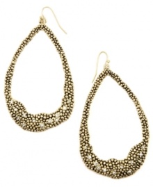 Organic inspiration. A subtle asymmetrical design makes RACHEL Rachel Roy's trendy hoop earrings a total must-have. Crafted in gold-plated mixed metal with sparkling crystal accents. Approximate drop: 3-1/4 inches.