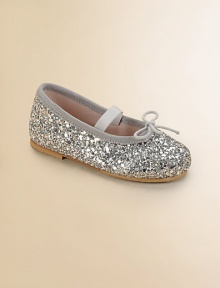 Sparkly slip-on, ballerina-inspired flats add a dash of glitz and glam to your little girl's precious feet.Elastic strap with adjustable tieFabric upperFabric liningRubber solePadded insoleImported