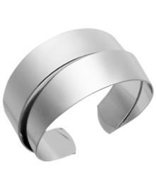 Structurally chic! Sequin's sculpture-inspired style features two overlapping rows stacked on top of one another. Cuff bracelet crafted in silver tone mixed metal. Approximate diameter: 2-1/4 inches.