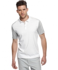 Block out boring summer style with this bold polo shirt from Calvin Klein.