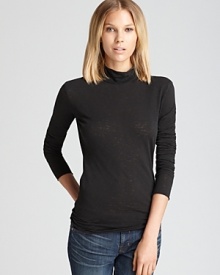 This rag & bone/JEAN polo tee is a fall layering essential. Top with a chic fur vest for luxe style.