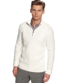 Traditional detailing in a fine knit creation. Calvin Klein's classic cable sweater redefines debonair style.