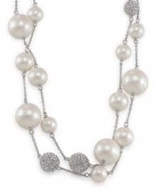 Let this elusive illusion necklace frame your neckline. Necklace features glass and crystal pearls and stones. Mixed metal silver tone setting. Approximate length: 42 inches.