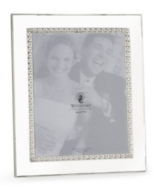 This silver-plated picture frame displays the classic elegance of Waterford. Makes a thoughtful gift.