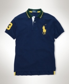 Accented with Ralph Lauren's Big Pony for iconic style, a trim-fitting tennis polo is crafted from breathable cotton mesh for superior comfort and performance.