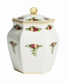 Garnished with the popular Old Country Roses dinnerware pattern, this charming biscuit jar from Royal Albert brings the bounty of the English countryside to casual kitchens. Fill with cookies, crackers and dry goods.