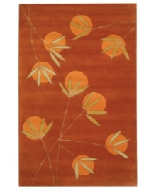 In bright shades of orange and red, this radiant area rug makes an impact in every room. The rug's unique color clarity and tonal depth is achieved by using only the purest New Zealand wool and accents of viscose for a silky soft feel. Hand-tufted in India.