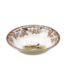 Bring the classic style of the English countryside to your table with the Woodland Collection by Spode. This traditionally patterned cereal bowl features the majestic lapwing framed by Spode's distinctive British Flowers border which dates back to 1828. Measures 8.