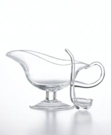 A clear winner for timeless style and versatility, the Michelangelo Masterpiece gravy boat is an invaluable addition to everyday and formal tables alike. Featuring a classic silhouette and coordinating ladle in luminous, lead-free glass from Luigi Bormioli's collection of serveware and serving dishes.