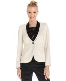 Up your wardrobe's wow factor with Tahari by ASL's cream-colored tuxedo blazer. Contrasting black lapels give this style a sophisticated spin.