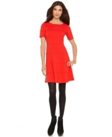 This petite ponte-knit dress by Spense is chic with its A-line silhouette and sleek, bandage-style seaming. Pair with dark tights and booties to look effortlessly put together. (Clearance)