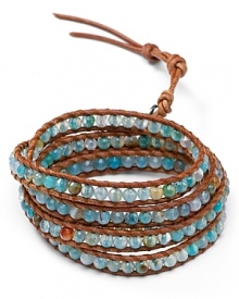 Chan Luu wraps up boho luxe style with this five-strand leather bracelet, accented by a free spirited mix of semi precious aqua-colored stones.