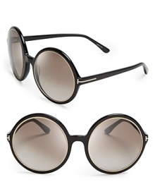 Tom Ford give wide-eyed, innocent frames sophisticated appeal with smoky, seductive lenses rimmed with luxe gold accents.