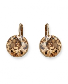 Be a golden girl in these stunners from Swarovski. Earrings feature bold yellow crystals on gold-plated mixed metal. Approximate drop: 1 inch.