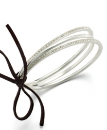 Give your outfit a boost with this set of three bangle bracelet. Crafted in silvertone mixed metal with crystal accents, by Lauren by Ralph Lauren. Approximate diameter: 2-3/4 inches.