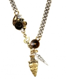 Can you dig it? Archaeological allure is the theme of RACHEL Rachel Roy's unique arrowhead pendant necklace. Crafted in gold tone and silver tone mixed metal, it's adorned with glittering crystal details. Approximate length: 23 inches. Approximate drop: 1-1/2 inches.