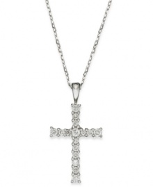 Slim and resplendent, this beautiful cross pendant features round-cut diamonds (1/4 ct. t.w.) set in 14k white gold. Approximate length: 16 inches. Approximate drop: 1 inch.