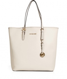 Sophisticated with simple, clean lines, MICHAEL Michael Kors textured leather tote is an elegant and versatile choice - Flat double top handles with buckle detail at base, metal logo on front, logo charm attached to handle, inside zippered back wall pocket, front wall slot pocket, cinch strap, strap with clip attached for keys - The perfect choice for work, school or running errands