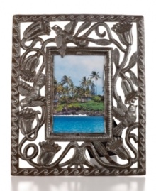 Preserve a beautiful landscape. The Flower Bud picture frame features recycled steel hand-cut with birds and blooms and hammered with a delicate wave motif inspired by Haiti's lively coast.