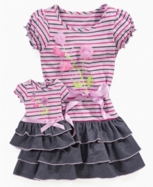 Pick out this striped floral jersey dress with attached denim skirt from Sweet Heart Rose and she can dress her dollie just as cute.