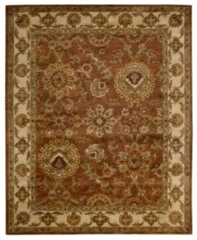 Rich with color and refined floral motifs, this Nourison area rug offers luxury for any space. Soft, durable wool is tufted by hand and herbal-washed for a beautiful, heirloom-quality texture and sheen.