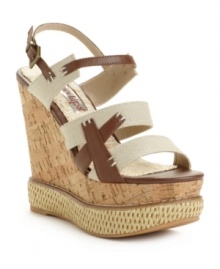 Go wild with the unique and flirty design of the Beserk wedge sandals by Two Lips. You'll fit right in at the clambake with the natural cork and rattan platform.