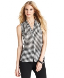 Vince Camuto's houndstooth blouse is the perfect layer to transition into fall with--wear solo with a pencil skirt or pair with a blazer and a pair of pants in a pop color.