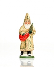 Truly one of a kind, this alluring Santa figurine is cast in an antique chocolate mold, then painted entirely by hand. A distinct gold coat and other fine detail make him a special addition to your Vaillancourt collection.