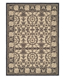 Taking inspiration from Art Nouveau-era designs, the Courtyard area rug boasts a crisp flourish of leaf and scroll patterns that is elegantly European in style. Hand-tufted of pure wool and coupled with a low-profile cut for streamlined, comforting style. (Clearance)