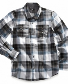 He'll keep his cool and his comfort in this plaid flannel shirt from DC Shoes.