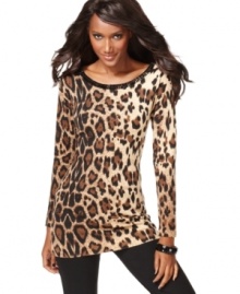 Get wild in INC's leopard print tunic sweater! Faceted stones along the neckline add extra sparkle, while a touch of cashmere gives it an ultra-soft feel.