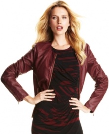 Calvin Klein's faux leather jacket is a gorgeous way to add structured edge to your ensemble--seamed details and shiny zippers make this piece especially sleek.