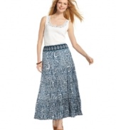 Smocking, a tiered construction and an exotic print give Style&co.'s maxi skirt a touch of boho-inspired glamour!