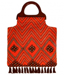 Luxe tote in fine, orange and brown cotton - Densely woven knit and diamond motif lend the bag its craftsy, retro-chic appeal - Wood handles - On-trend, tassel fringe embellishment - Roomy shopper style easily fits all of the essentials - Versatile and cool, adds a touch of boho glamour to jeans, tunic tops and mini dresses