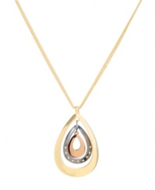 Intergalactic glamour. Kenneth Cole New York's stunning orbital-style pendant includes rows of silver, gold, and bronze-plated mixed metal with sparkling crystal accents. Approximate length: 16 inches + 3-inch extender. Approximate drop: 2 inches.