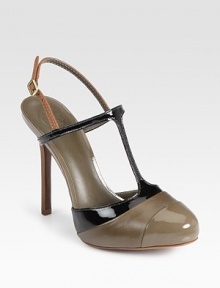 Secured by an adjustable slingback, this leather platform pump has contrasting patent leather trim and a t-strap. Self-covered heel, 4½ (115mm)Hidden platform, ½ (15mm)Compares to a 4 heel (100mm)Leather and patent leather upperLeather lining and solePadded insoleImportedOUR FIT MODEL RECOMMENDS ordering one half size up as this style runs small. 