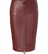 Tough goes luxe with this supple zipper-detailed leather pencil skirt from Hakaan - Classic pencil silhouette, slash pocket, front two-way exposed zip closure, seaming details, fitted - Wear with a luxe pullover or silk blouse and platform pumps