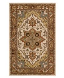 An elegant pattern, this Nourison rug features a design that melds classic Persian motifs with chic, natural color. With its opulent 100% natural wool construction, this yarn-dyed and meticulously hand-tufted rug offers a beautiful accent to traditional home décor.