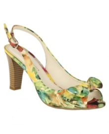 Step into springtime. The Darling pumps by Etienne Aigner feature a colorful all-over floral print.