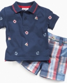 Set sail across the sea! Prepare him for any warm-weather adventure in this stately nautical polo shirt and plaid short set from Blueberi Boulevard.