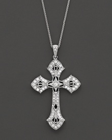 With beautiful filigree detail and diamonds, this cross pendant necklace brings a vintage charm to your look.