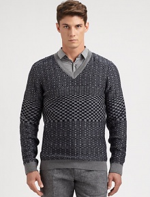 A well-knitted wool pullover sweater is printed in a textural, geometric pattern for a look that exudes modern elegance.V-neckRibbed knit cuffs and hemWoolMachine washImported