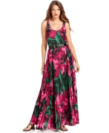 MICHAEL Michael Kors' exotic floral print evokes thoughts of far-flung places. A matching belt and fully pleated skirt finish the look with dramatic effect.