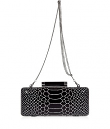 Chic clutch in fine, black leather - Elegant, on-trend python look - Rectangular box shape with contrasting hardware - Practical hard-shell design - Removable silver chain link strap - Tubular detail at snap closure - Versatile and polished, a must for cocktails, dinners and parties - Roomy enough to fit all of the evening essentials