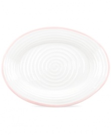 Distinctly ribbed Sophie Conran dinnerware sets your table with the charm of traditional hand-thrown pottery, but the durability of contemporary Portmeirion porcelain. Mix the banded Carnivale platter with solid pink pieces.