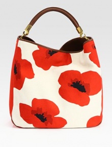 A pretty poppy-print highlights canvas in this roomy top-handle carryall.Leather top handle, 7½ dropTop snap closureOne inside zip pocketTwo inside open pocketsCotton lining114W X 14H X 6¼DMade in Italy